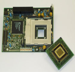 Figure 2: The 128x128 pixel Cellular Visual Microprocessor and its testing board.
