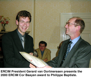 ERCIM President Gerard van Oortmerssen presents the 2000 ERCIM Cor Baayen award to Philippe Baptiste.