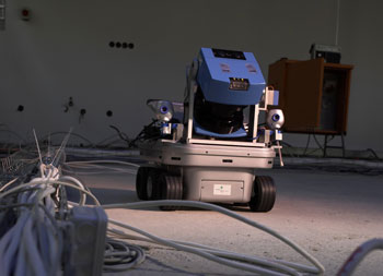 Figure 1: The autonomous mobile robot Kurt3D mapping a construction site.