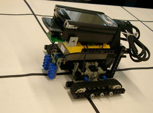 A robot with a PDA and wireless card running PROSE for dynamic adaptation