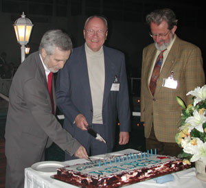 The ERCIM 15th Anniversary cake was cut during the Gala Dinner. From left: Stelios Orphanoudakis, Gerhard Seegmüller and Cor Baayen