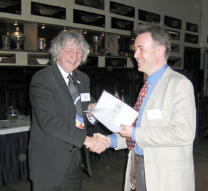 Keith Jeffery (left) presents the Working Group Award to Eric Pauwels.